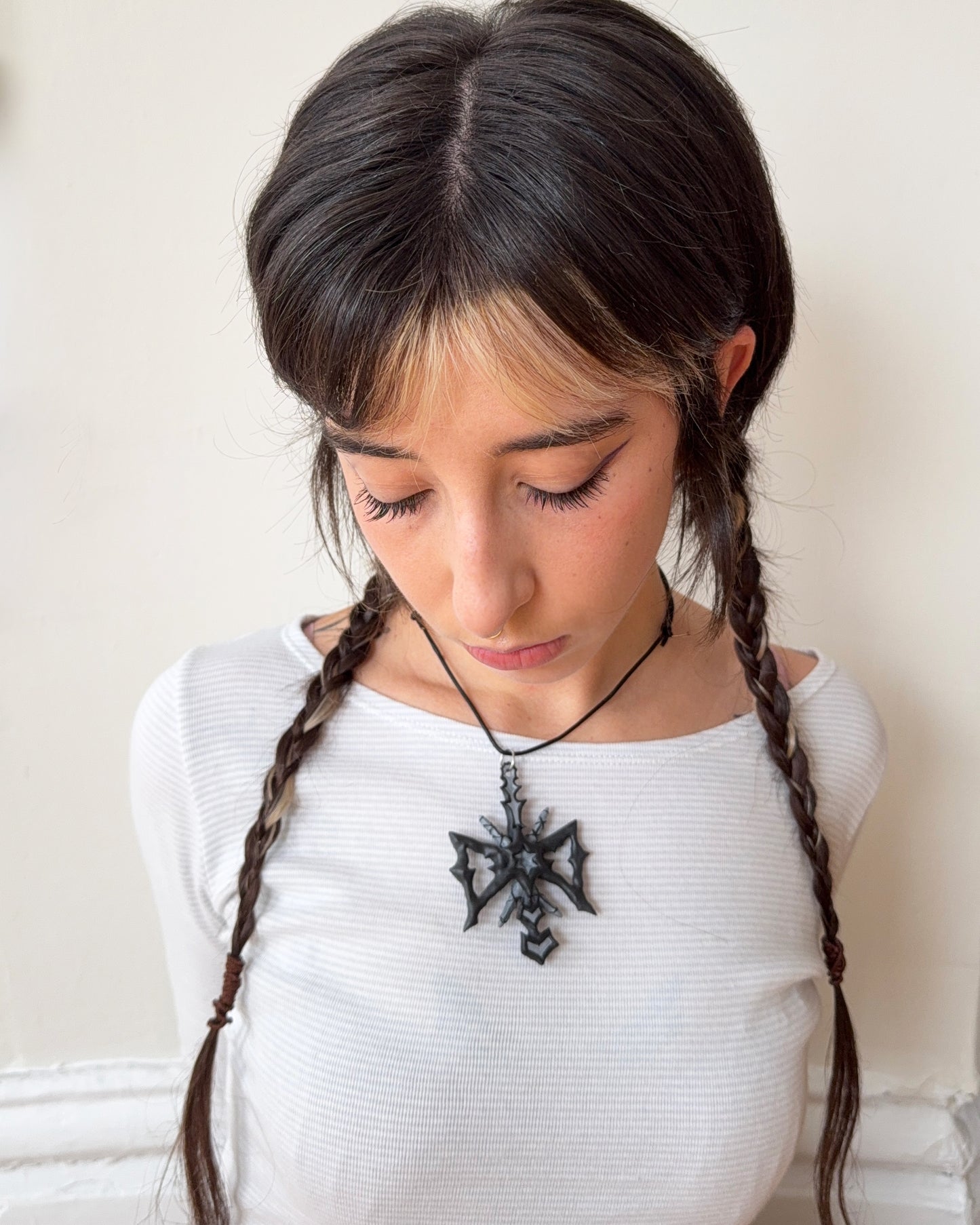 spikey bow drop necklace