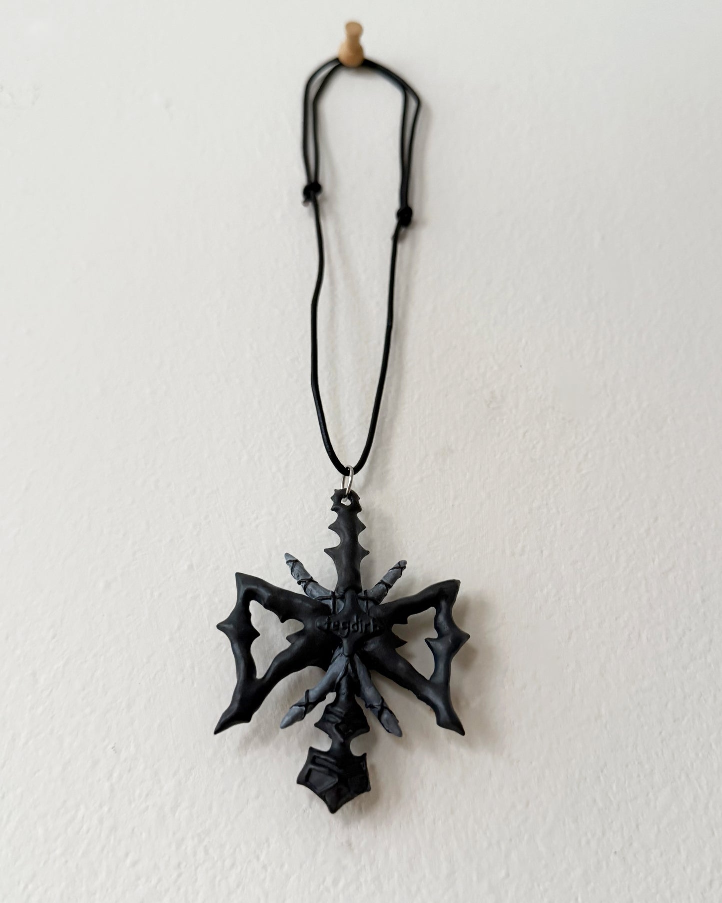 spikey bow drop necklace