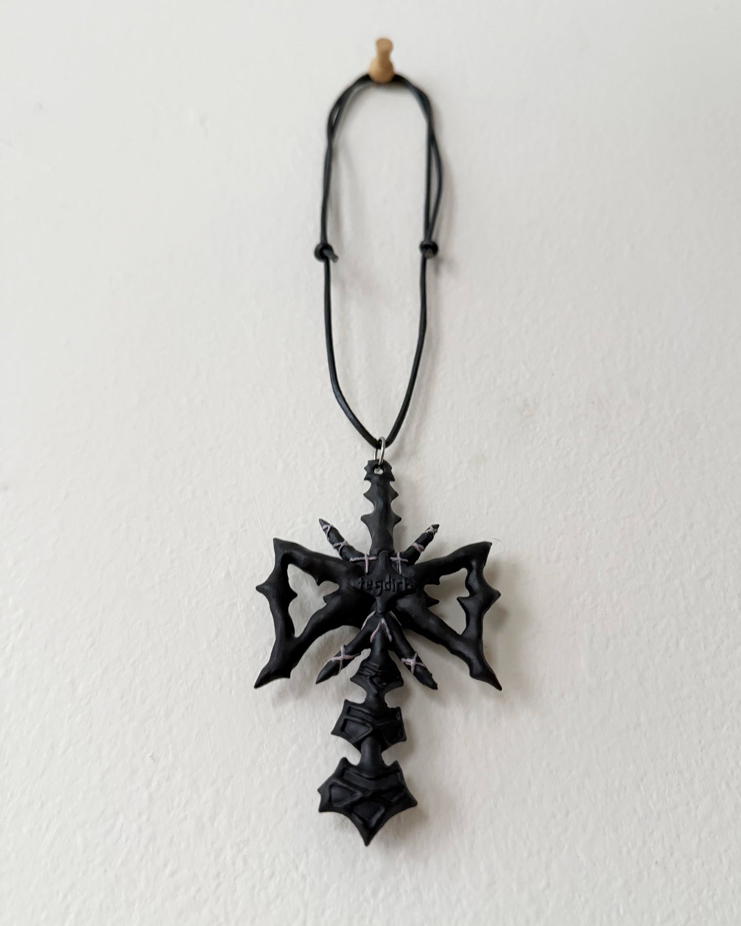 spikey bow drop necklace