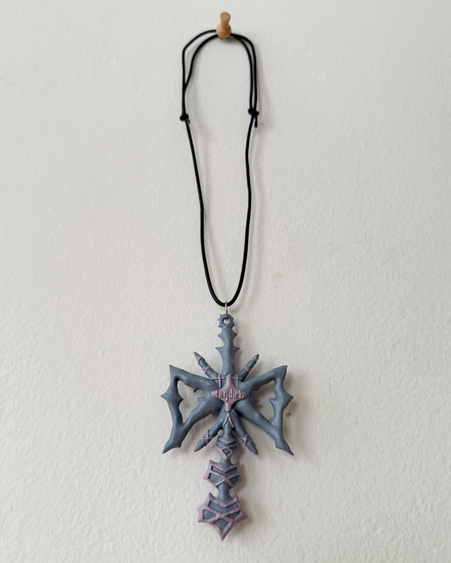 spikey bow drop necklace