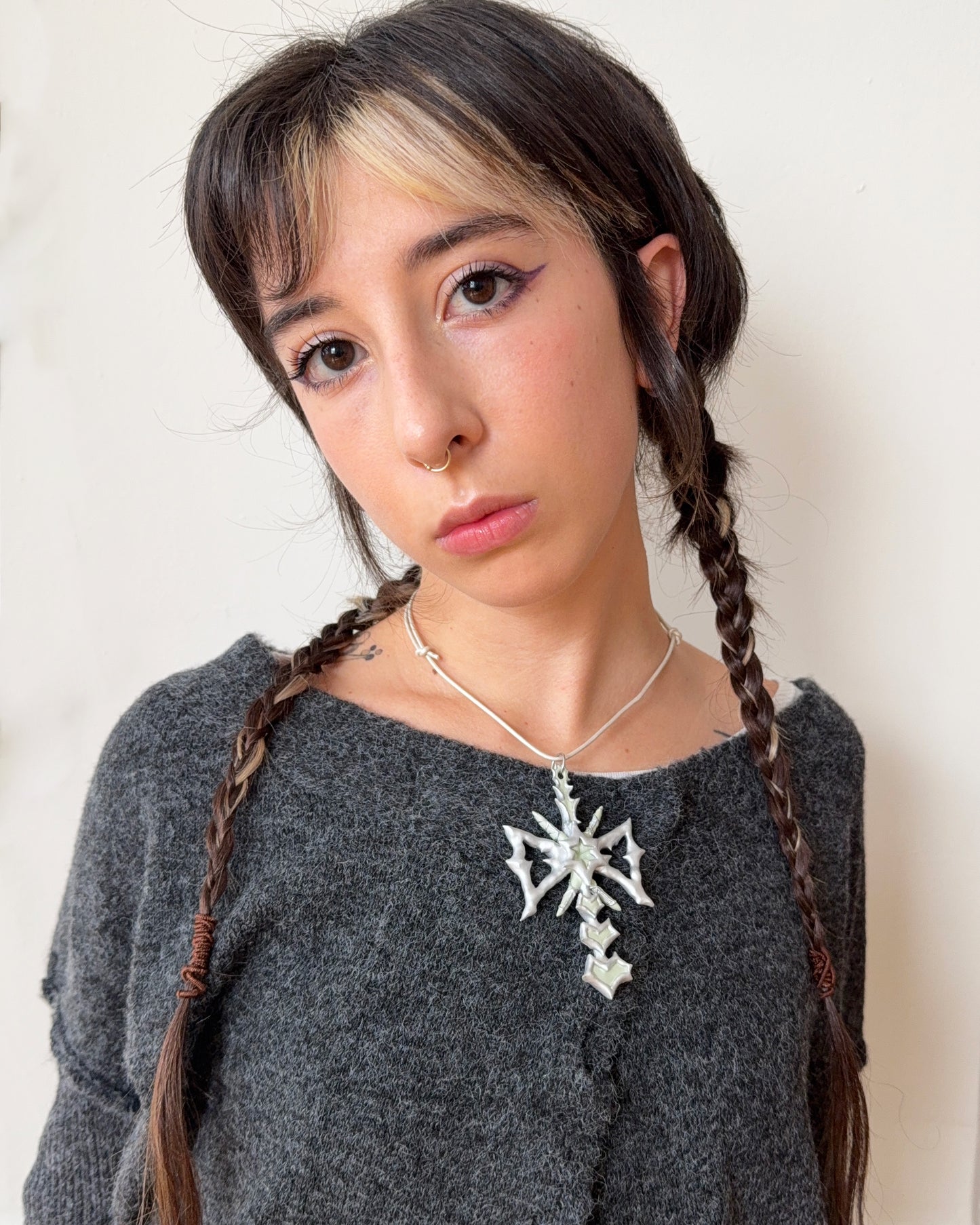 spikey bow drop necklace