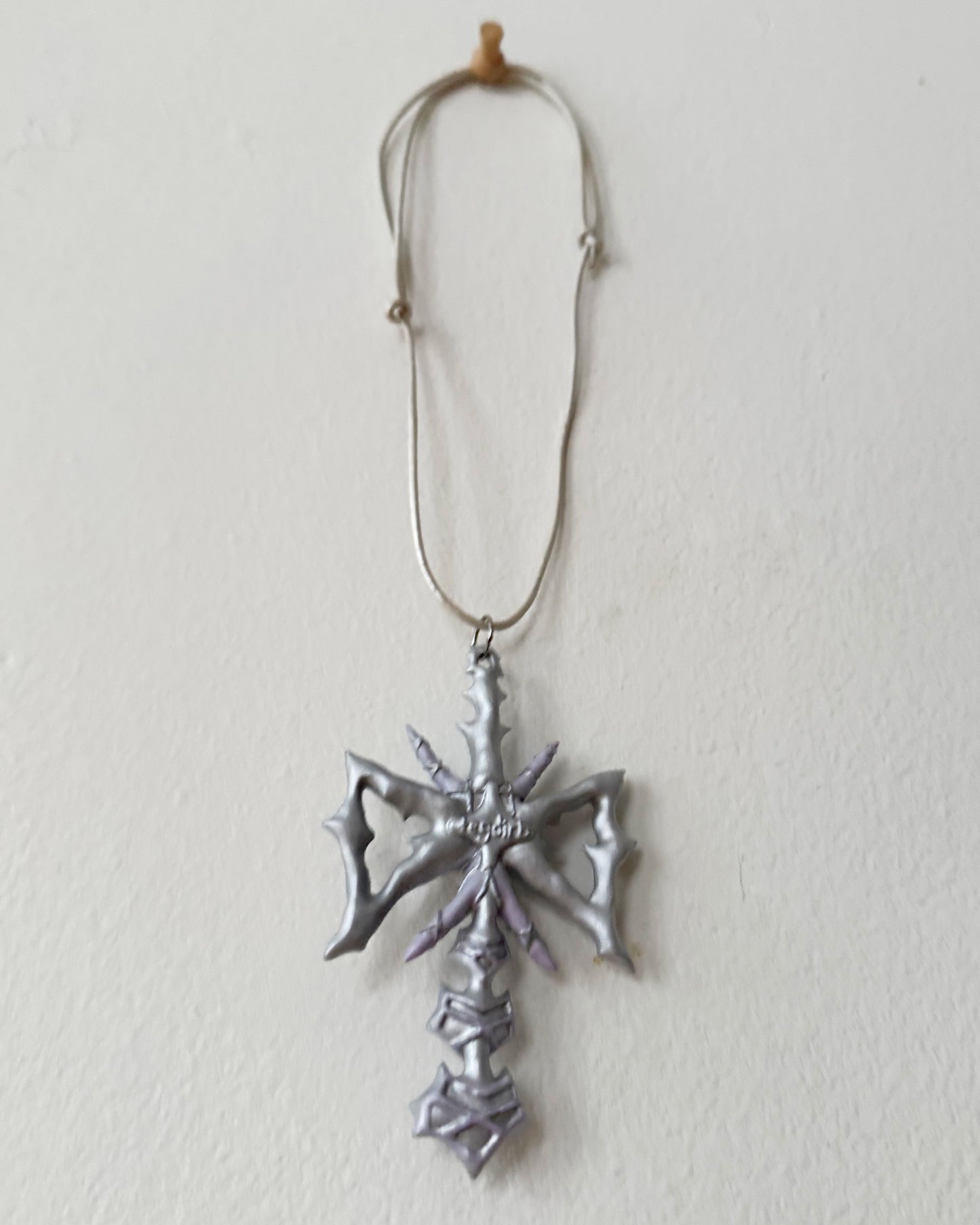 spikey bow drop necklace