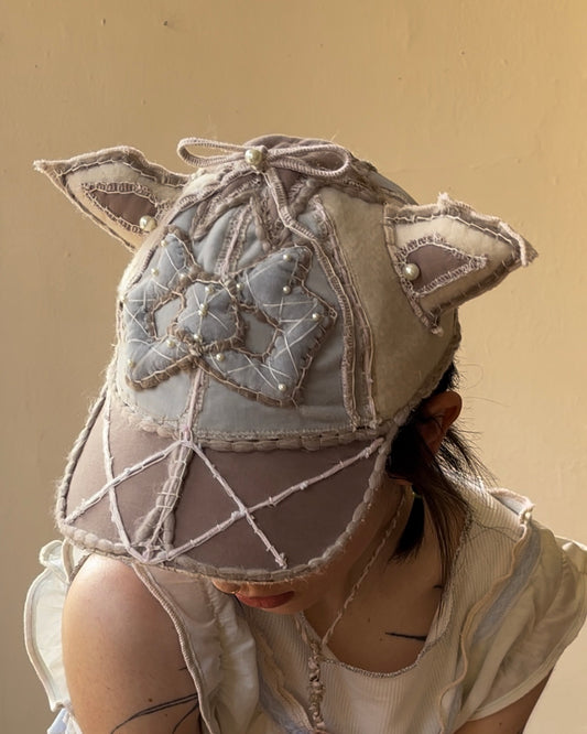 pearl creature cap